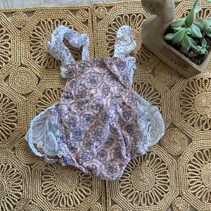 Pink floral tie back lace ruffle romper